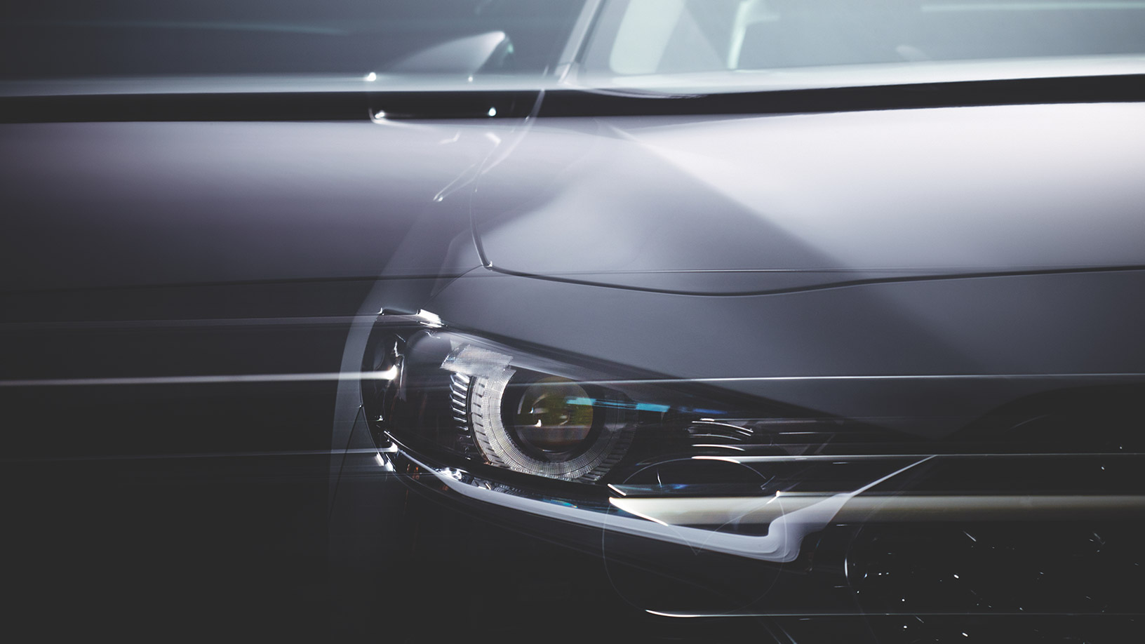 Bilde av fronten av en splitter ny Mazda fra Bilservice og bilSpiten